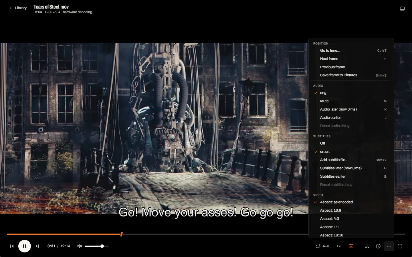 The More menu open above the deck, with sections for position, audio, subtitles and video, each item showing its key.