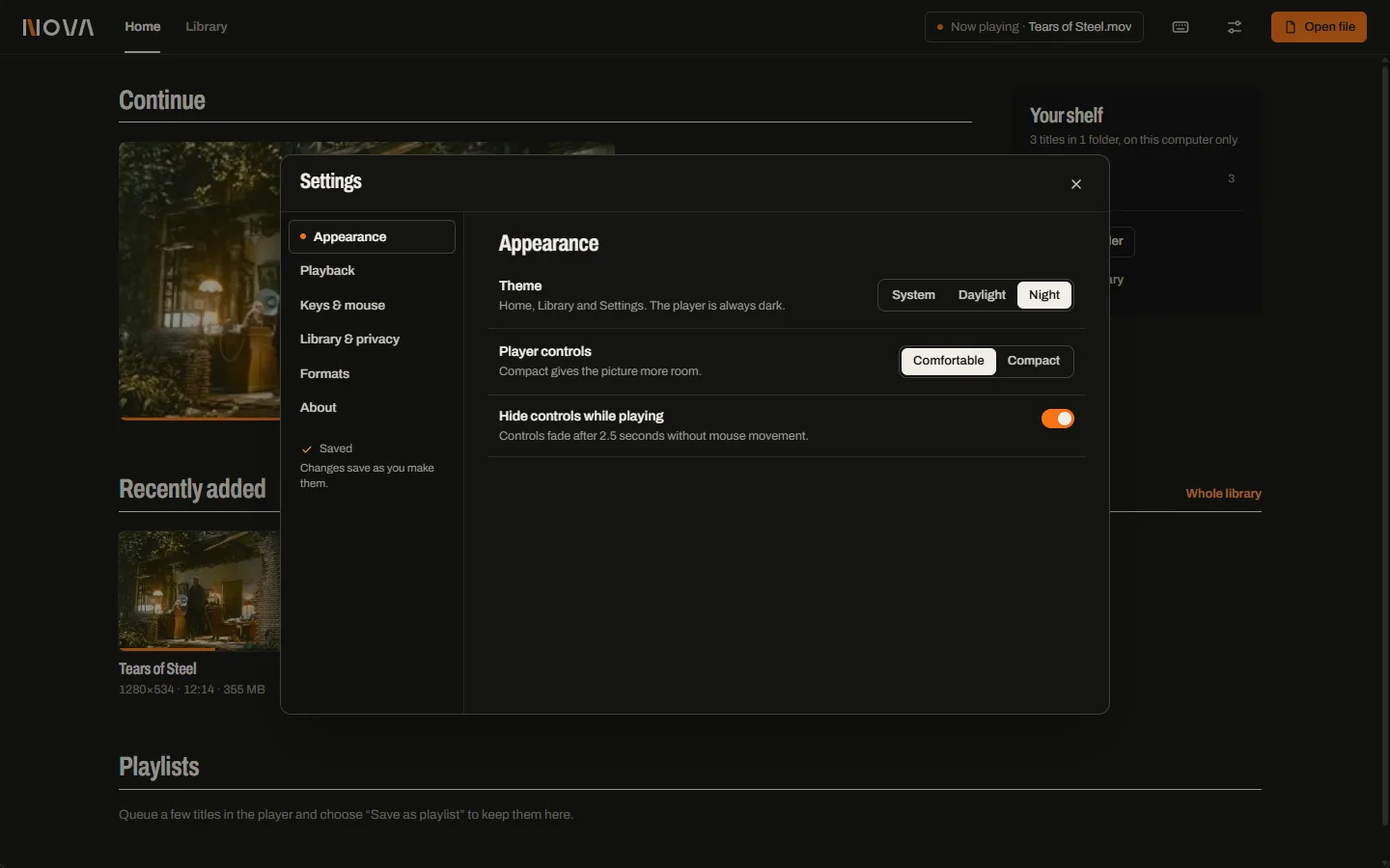 Settings, Appearance in the Night theme with System, Daylight and Night choices and a Saved confirmation.